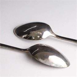 Set of six silver teaspoons and sugar tongs, with embossed foliate decoration, hallmarked I S Greenberg & Co, Birmingham probably 1917