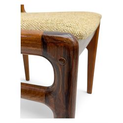 Johannes Andersen for Uldum Mobelfabrik - set of eight Danish teak dining chairs, each with open back rests with curved edges, upholstered seats in a neutral woven fabric, raised on tapered supports