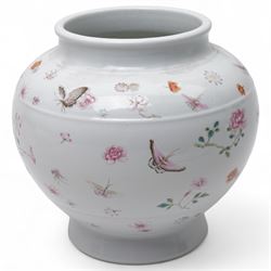 18th century Chinese famille rose vase, decorated with flowers and butterflies on a white ...