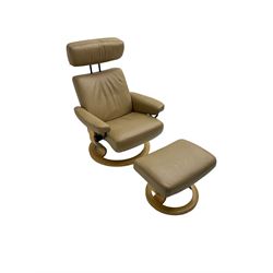 Ekornes Stressless - reclining armchair upholstered in latte leather, with footstool