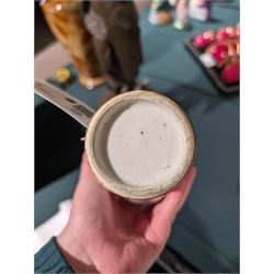 Chinese Export famille rose baluster form vase and cover, decorated with a bird perched on a flowering branch beside rocks, Qianlong style, probably later, H22.5cm