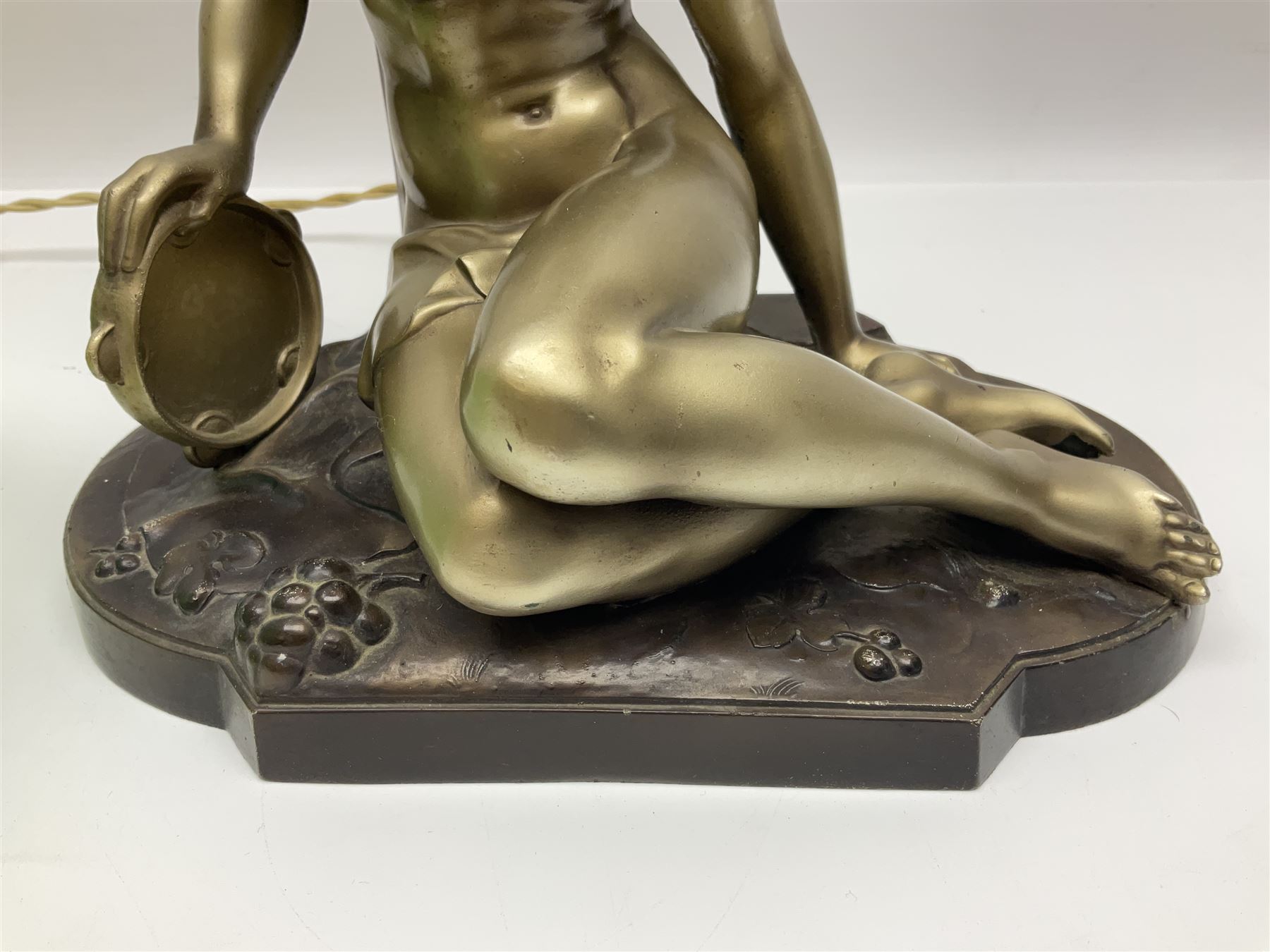 Art Deco style bronzed and gilded spelter figural table lamp with green Uranium glass shade; H48cm, another table lamp; and a bisque group