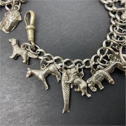 Silver charm bracelet, with twenty-five mostly animal charms including lion, greyhound, cat, horse, elephant and fish etc
