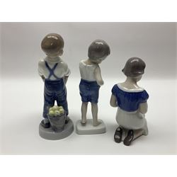 Five Royal Copenhagen figures, comprising Pan playing pipes no 1736, Boy on marrow no 4539, Baby crawling no 1518, Drummer boy no 3647 and Boy with apples no 4532, together with three similar figures