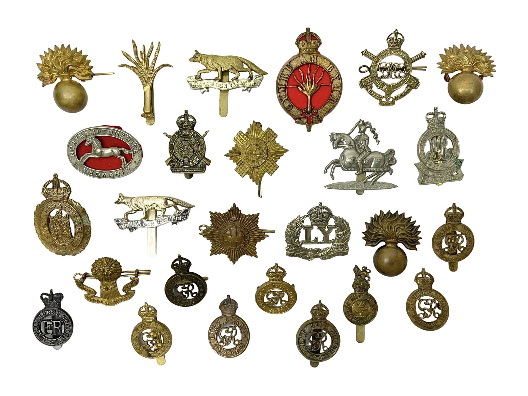 Twenty-six cap badges for Yeomanry and various guards including Fife & Forfar, Lothian and Border Horse, Leicestershire, Northamptonshire, Queens Own, Coldstream, Grenadier, Machine Gun Regiment, Life Guards etc (26)