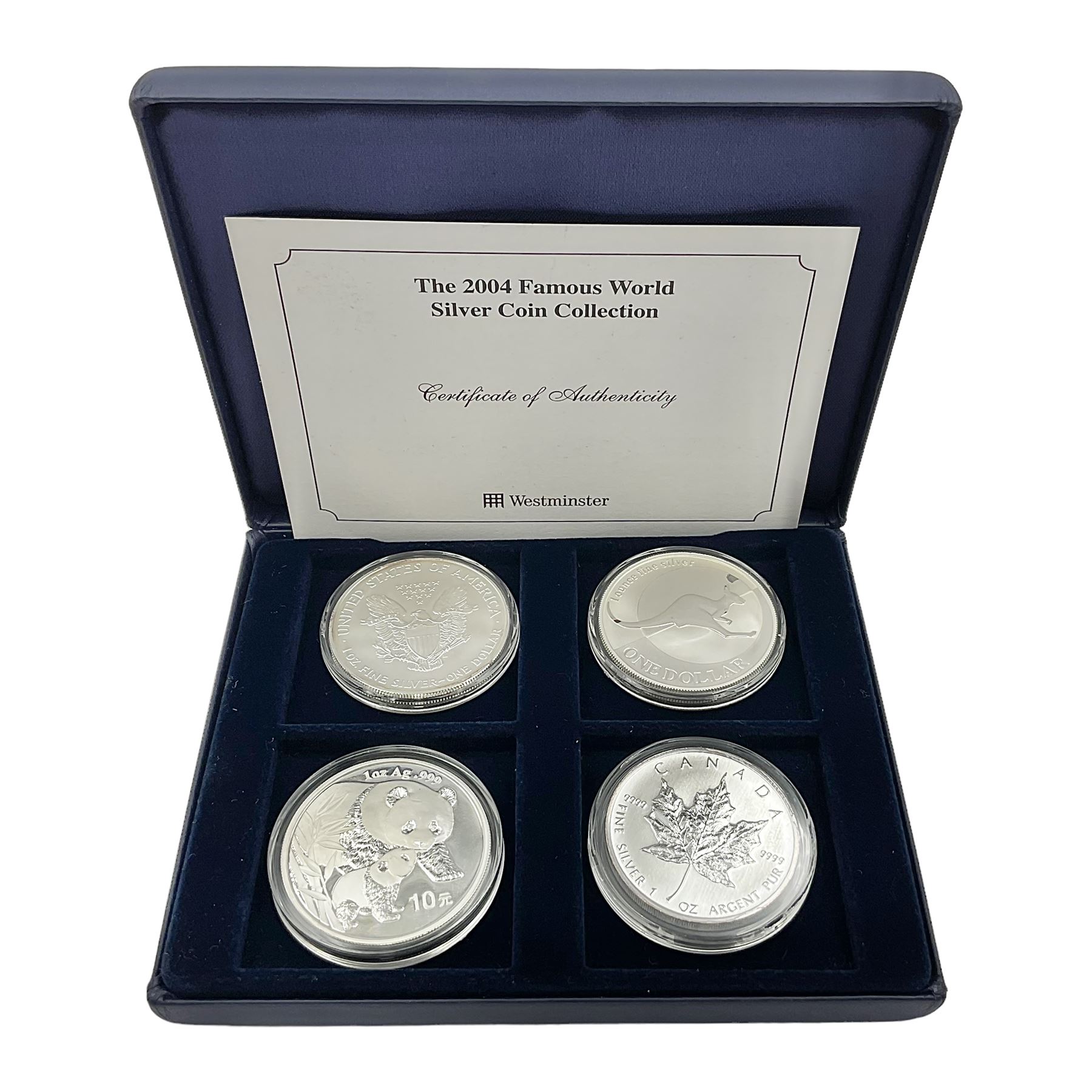 Four one ounce fine silver coins, forming 'The 2004 Famous World Silver Coin Collection', comprising United States eagle, Australian kangaroo, Chinese panda and Canadian maple leaf, cased with Westminster certificate 
