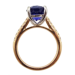 Platinum and 18ct rose gold oval synthetic sapphire ring, with diamond set shoulders, hallmarked and stamped 950, sapphire approx 5.00 carat