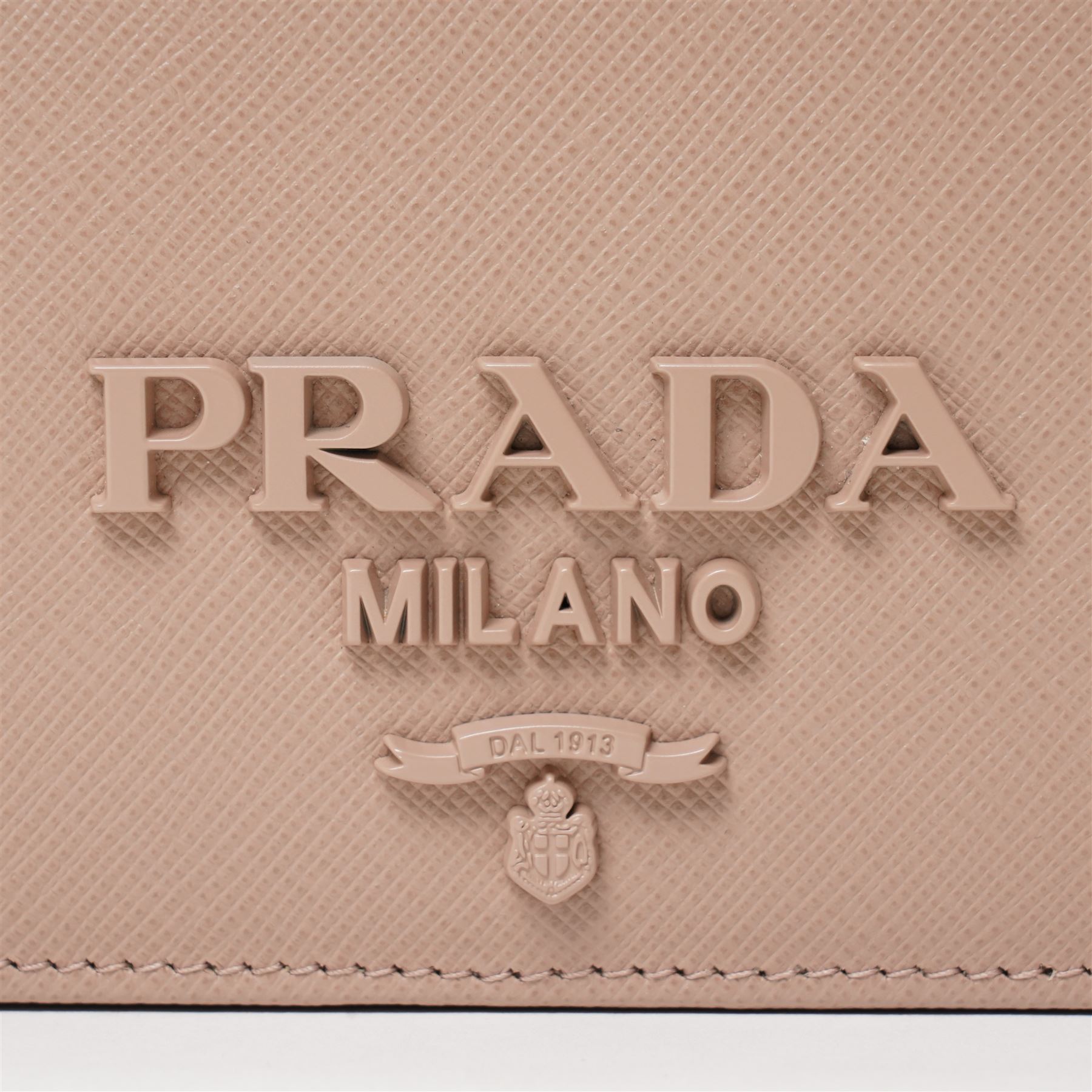 Prada - Saffiano Leather Mini Crossbody Bag, in structured nude-pink leather with detachable gold-tone chain shoulder or crossbody strap and hardware, Prada Milano raised logo, with crimson leather interior, unused with original dust bag