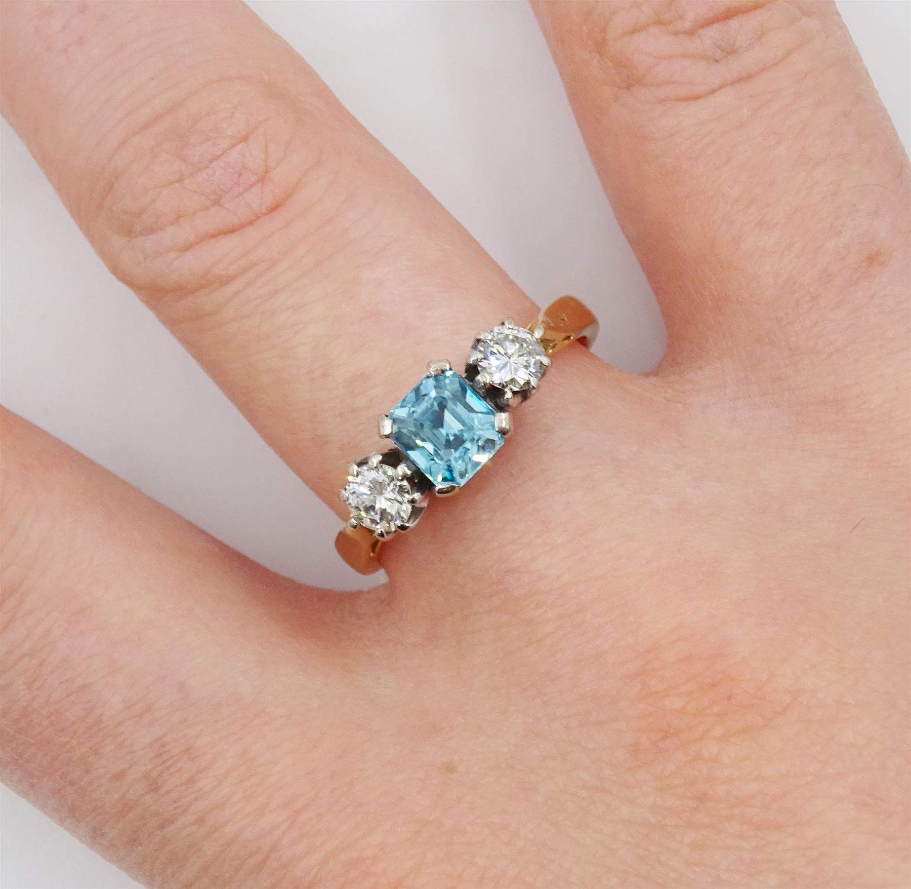 18ct gold three stone blue zircon and round brilliant cut diamond ring, hallmarked, total diamond weight approx 0.40 carat