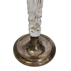 Drimmer table lamps, decorated with flowers upon a blue ground, together with a glass tulip vase upon a silver base, hallmarked 