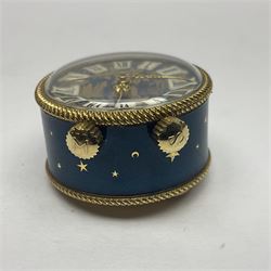 Bueche Girod silver-gilt and enamel novelty miniature clock, with a band of gilt moon and star decoration upon a deep blue enamel ground, with enamel and gilt foliate dial, with musical mechanism playing happy birthday, D2.7cm, in suede pouch