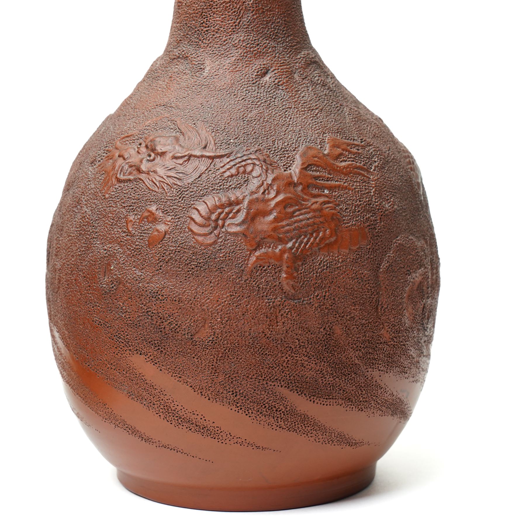 Pair of Chinese redware vases in the Yixing style, early 20th century, decorated with dragons among clouds, one bearing impressed marks to base, H30cm (2)