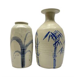 Jeremy Leach (British 1941-): Two Lowerdown Pottery Stoneware vases, one with flared trumpet neck, shouldered baluster body painted in blue with Bamboo and the other having similar decoration, impressed marks to both H32.5cm max (2)