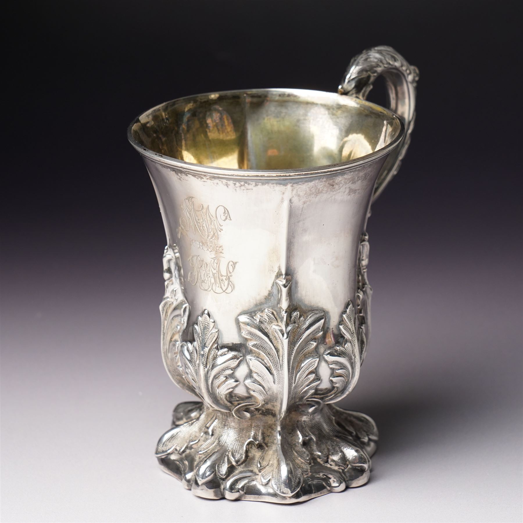 Victorian silver cup with acanthus leaf decoration and scroll handle, H12cm with retailers mark of J Mayer, Liverpool Sheffield 1851Maker Henry Wilkinson & Co