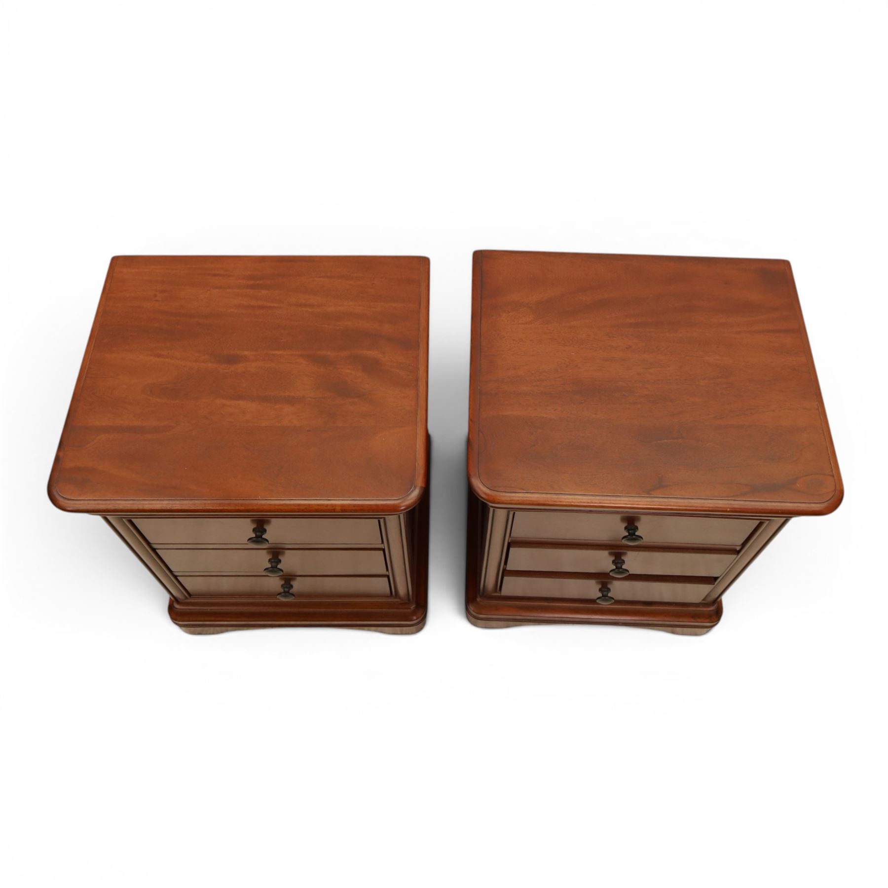 Willis & Gambier - mahogany pair of bedside cabinets, with frieze drawer with blue baize lined interior, panelled sides and three drawers raised on bracket feet