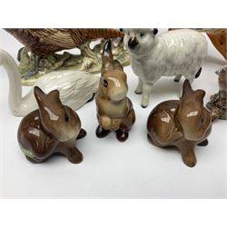 Group of Beswick figures to include leopard no 1082, rabbits, swan, pheasant no 1226 etc, all with marks beneath