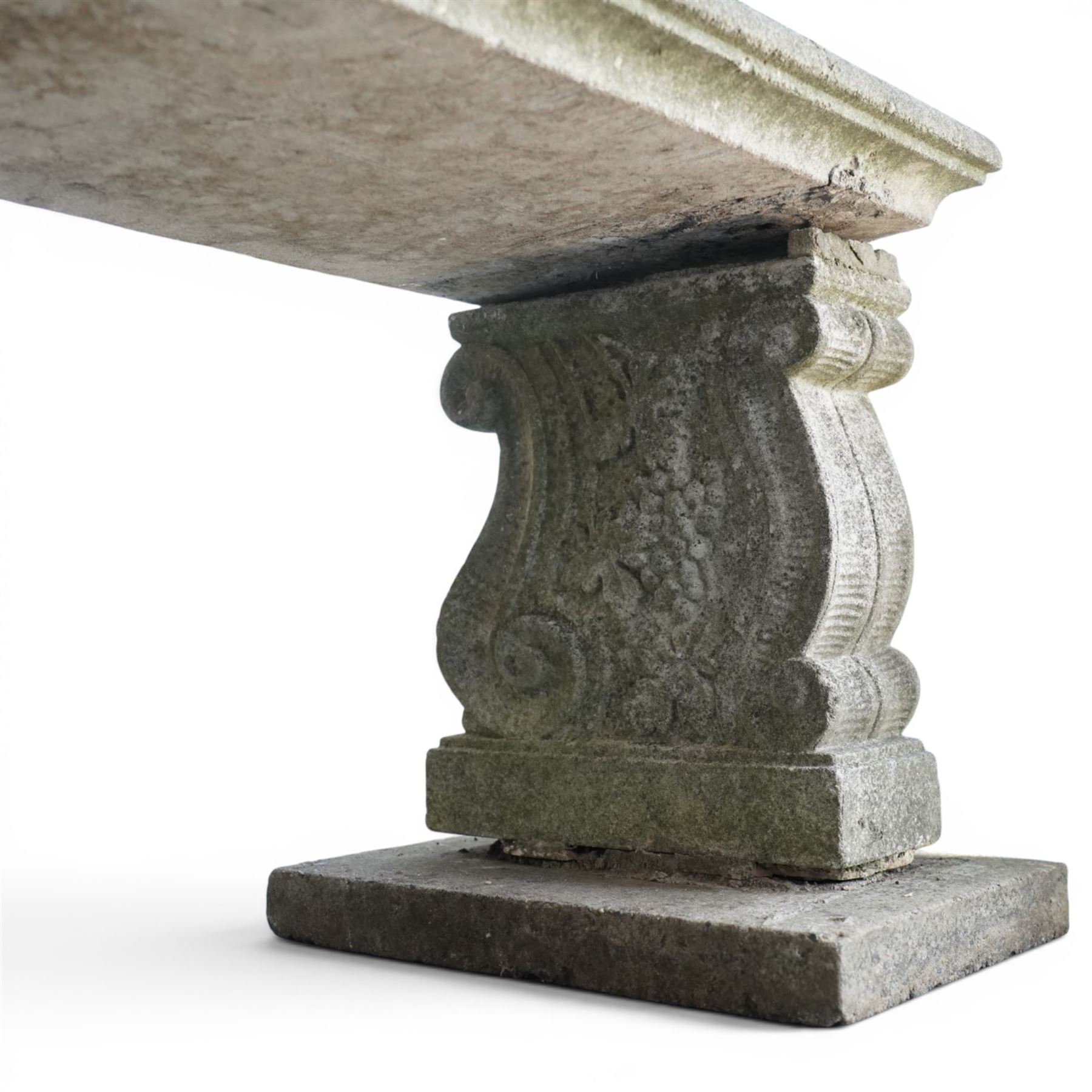 Cast stone garden bench with moulded edge