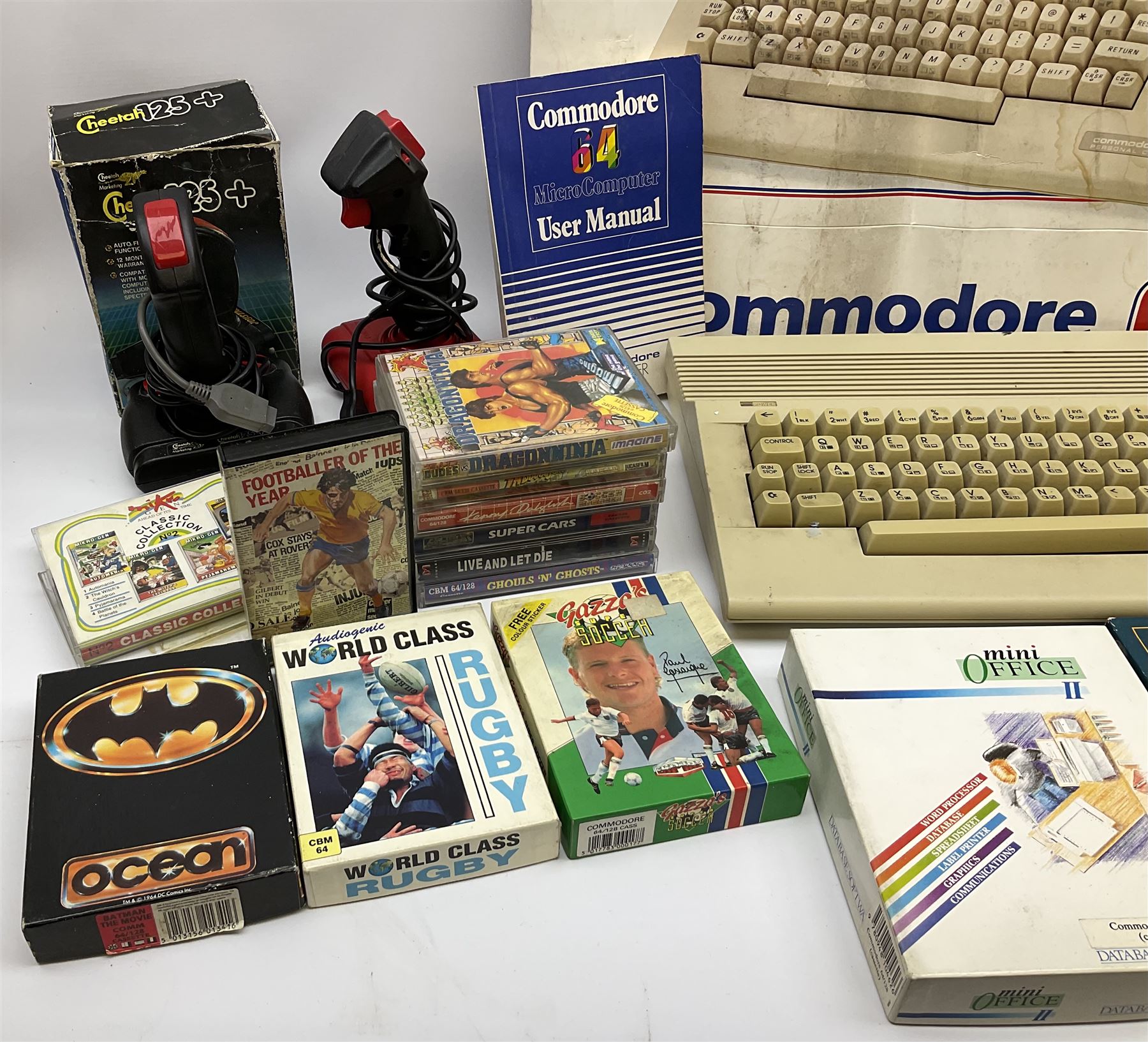 Commodore 64 games computer with boxed 1530 Datassette Unit Model C2N, two joysticks, over seventy games and twenty-two Commodore magazines; polystyrene box inner and card slip-case
