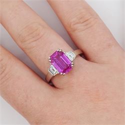Platinum unheated pink sapphire and diamond three stone ring, emerald cut unheated sapphire of approx 3.16 carat, with a single trapeze cut diamond set either side, London 2014, total diamond weight approx 0.71 carat, with Alan Poultney Gems report, the sapphire with The Gem & Pearl Laboratory report