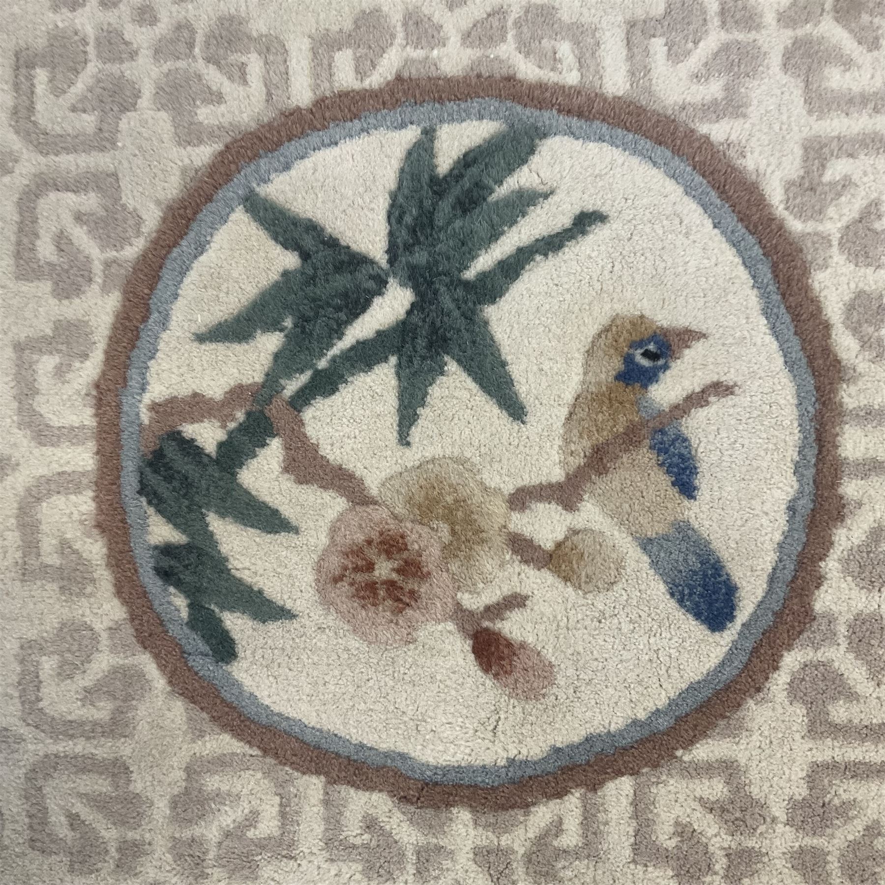 Circular Chinese washed woollen rug (D128cm); circular Chinese washed woollen rug (D100cm); rectangular washed woollen rug (196cm x 91cm)