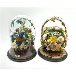 A Victorian glass dome, with enbonised base, H49cm, together with a Victorian shellwork floral display on ebonised base, (lacking dome), H40cm. (2). 