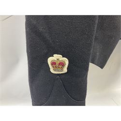 Uniformal two-piece uniform in black and white bearing embroidered Queens crown to one sleeve