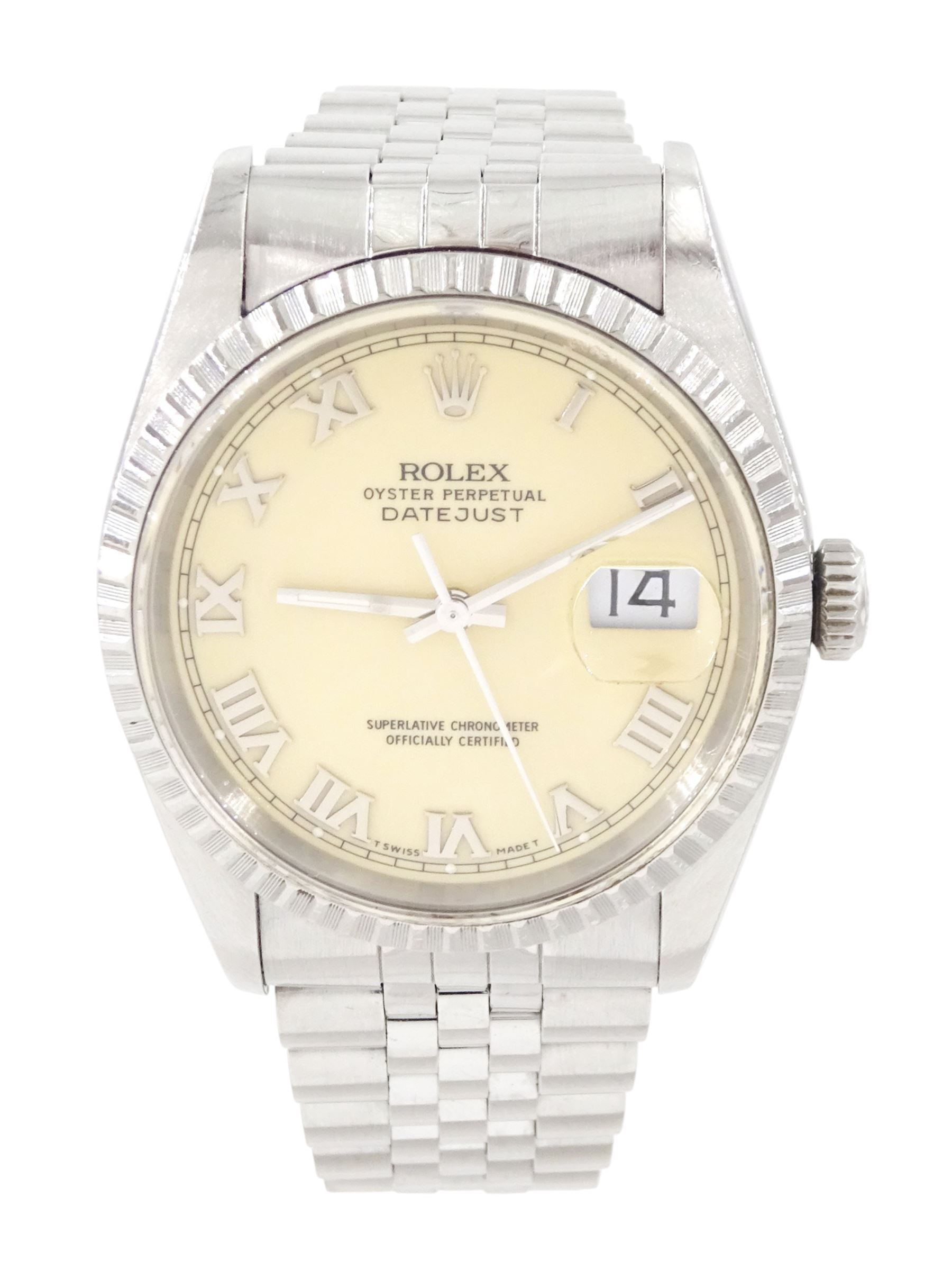 Rolex Oyster Perpetual Datejust gentleman's stainless steel automatic wristwatch, circa 1990, Ref. 16220, serial No. E271806, cream dial with Roman numeral hour markers, on Jubilee stainless steel bracelet with fold-over clasp, boxed with papers