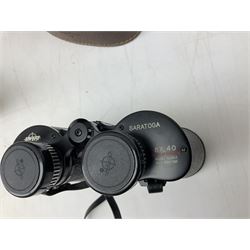 Cast metal nutcracker, in the form of a dog together with a pair of Swift Saratoga 8x40 binoculars in leather case and a hip flask, the glass flask covered in leather to the top with a detachable silver plated cup to base