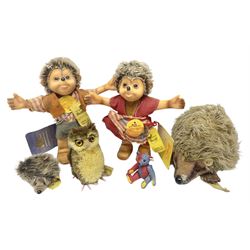 Group of Steiff figures, comprising Mikki and Mukki, circa 1950s no 7628/12 and 7627/12, with original tags, two hedgehogs no 1570/10, and another smaller 1670/03, small owl no 7480/06, and painted metal Steiff harlequin style bear