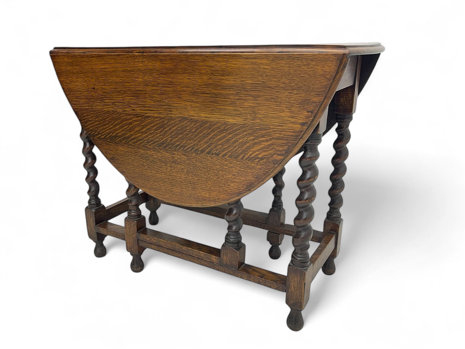 20th century oak drop-leaf dining table on spiral turned supports 