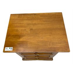 Pair of contemporary cherry wood bedside chests, rectangular top and projecting moulded cornice over three drawers, on plinth base with shaped apron