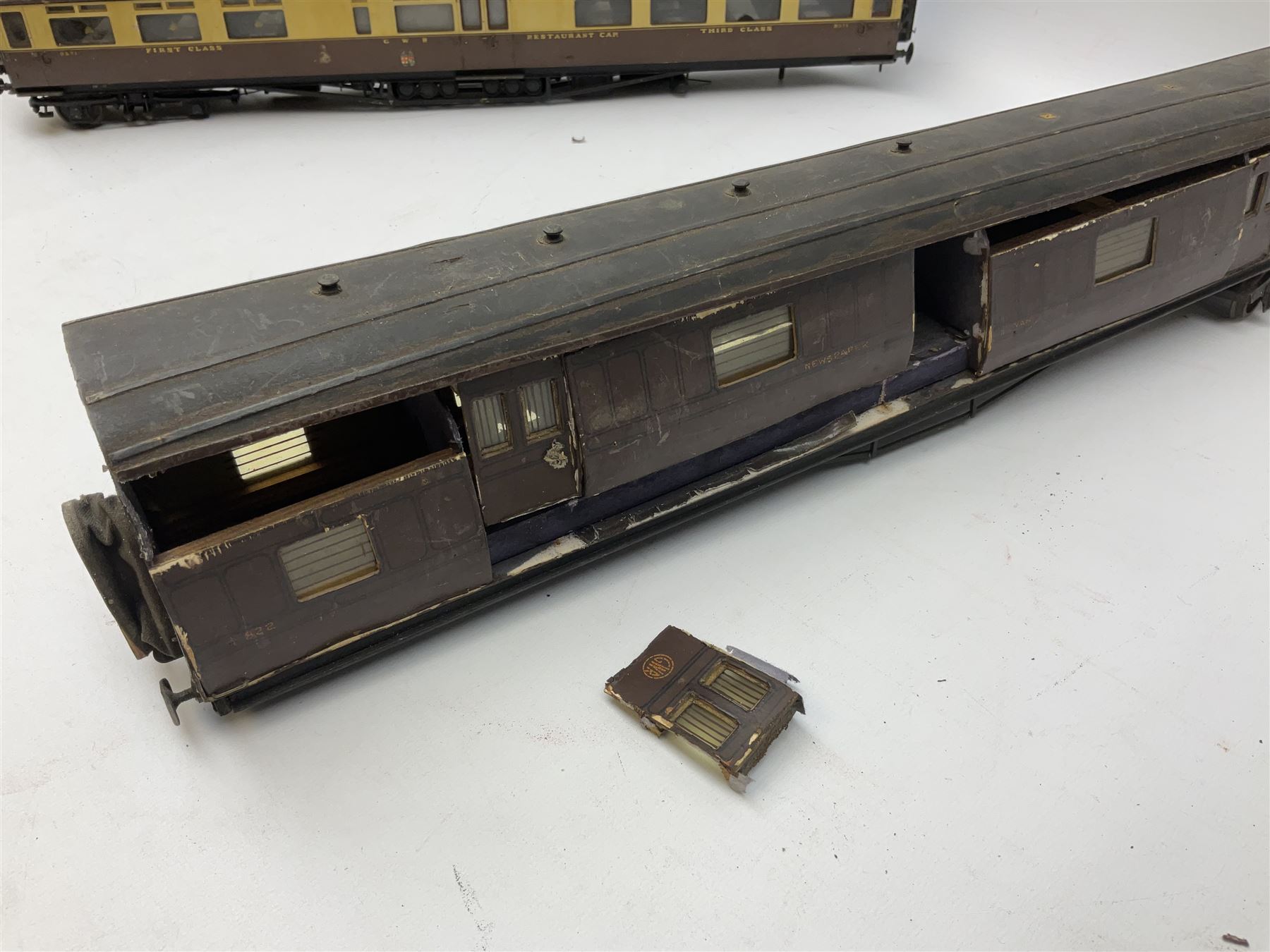 '0' gauge - eight early 20th century scratch-built coaches with GWR livery including three restaurant cars, newspaper van, luggage/guards van etc