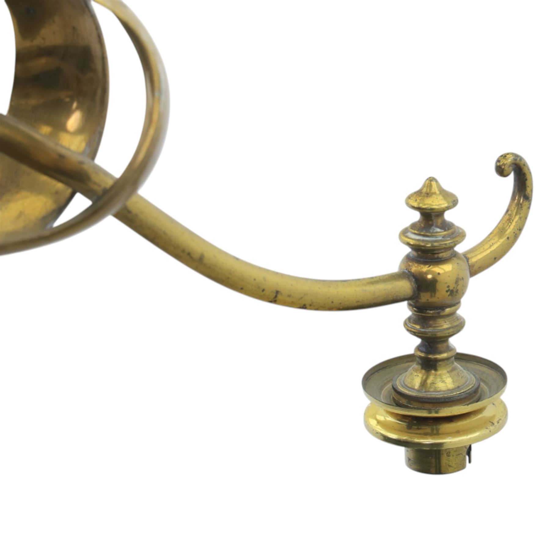 20th century Art Nouveau brass wall light, vertical stem with three scrolling arms terminating in lamp holders, central baluster element with curving supports