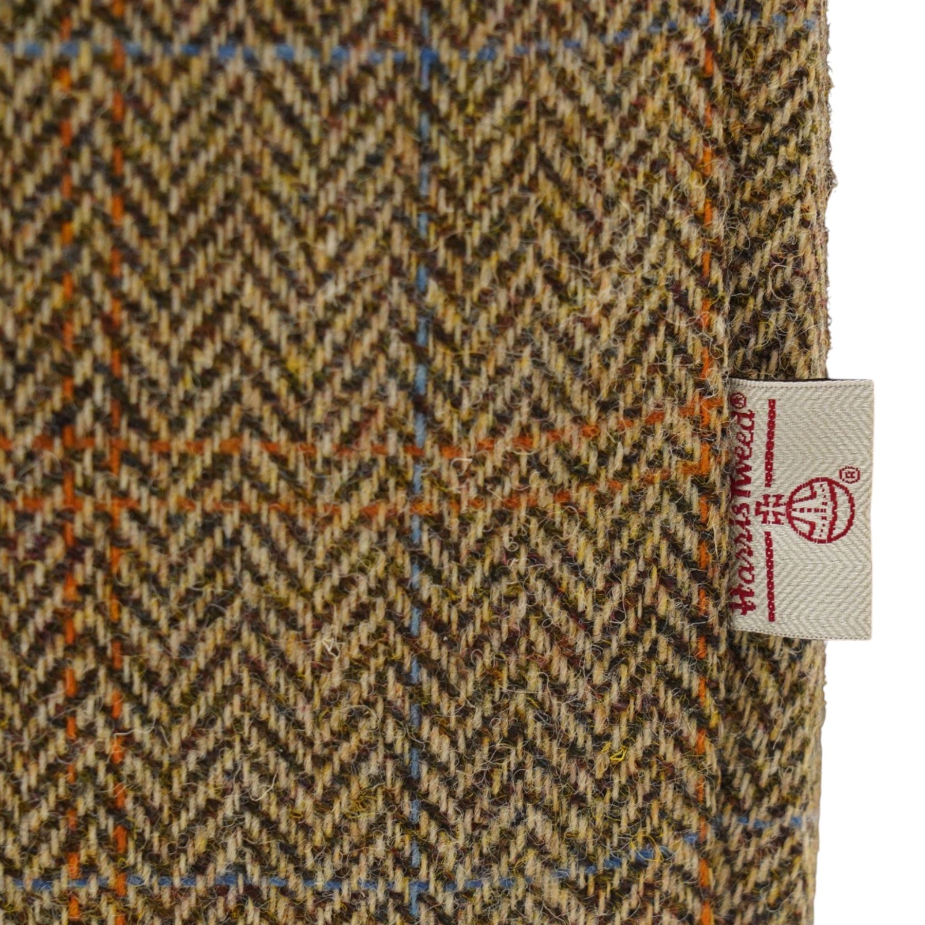 Tetrad - 'Matisse' snuggler armchair or loveseat, Chesterfield shape with rolled arms flanking a serpentine back and front, upholstered in herringbone pattern Harris Tweed and tan leather with close-nailed studwork, on turned feet