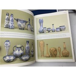Moorcroft, 1897-1993 revised edition; an illustrated guide to Moorcroft Pottery, a hard back book by Paul Atterbury, together with a quantity of Moorcroft Collector's Club magazines