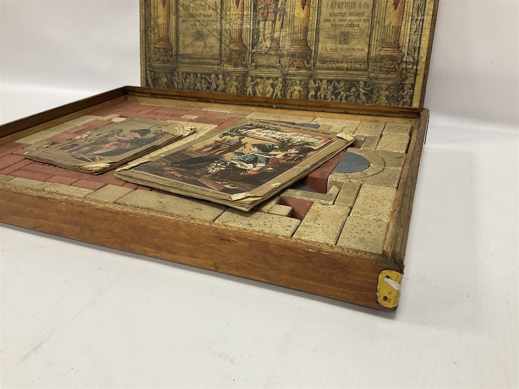 Richters 1880s Anchor Box Stone Block Building set, in original wooden box with sliding lid and paper label; with two instruction booklets, circa 1880-1900s