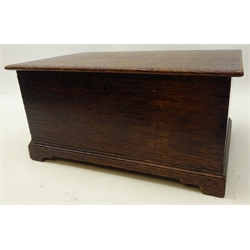  Victorian oak box in the form of a Coffer, lid with strapwork hinges, dovetail jointed body on shaped bracket feet, W37cm, H19cm, D23cm  