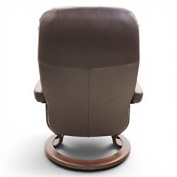 Ekornes - Stressless medium brown leather recliner swiveling armchair and stool, brown leather recline with stitching, together with a matching stool, on a round base