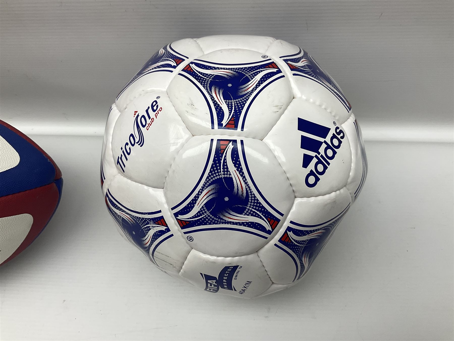 England Rugby official replica ball by Gilbert signed by Mike Tindall, together with a FIFA football