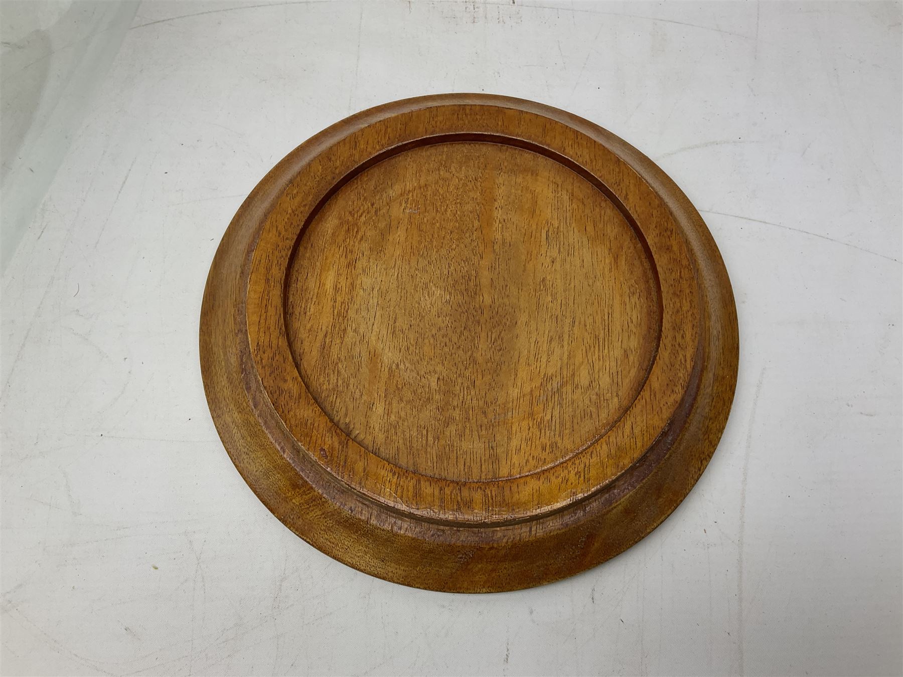 Glass dome display covers on a circular wooden base, H46cm