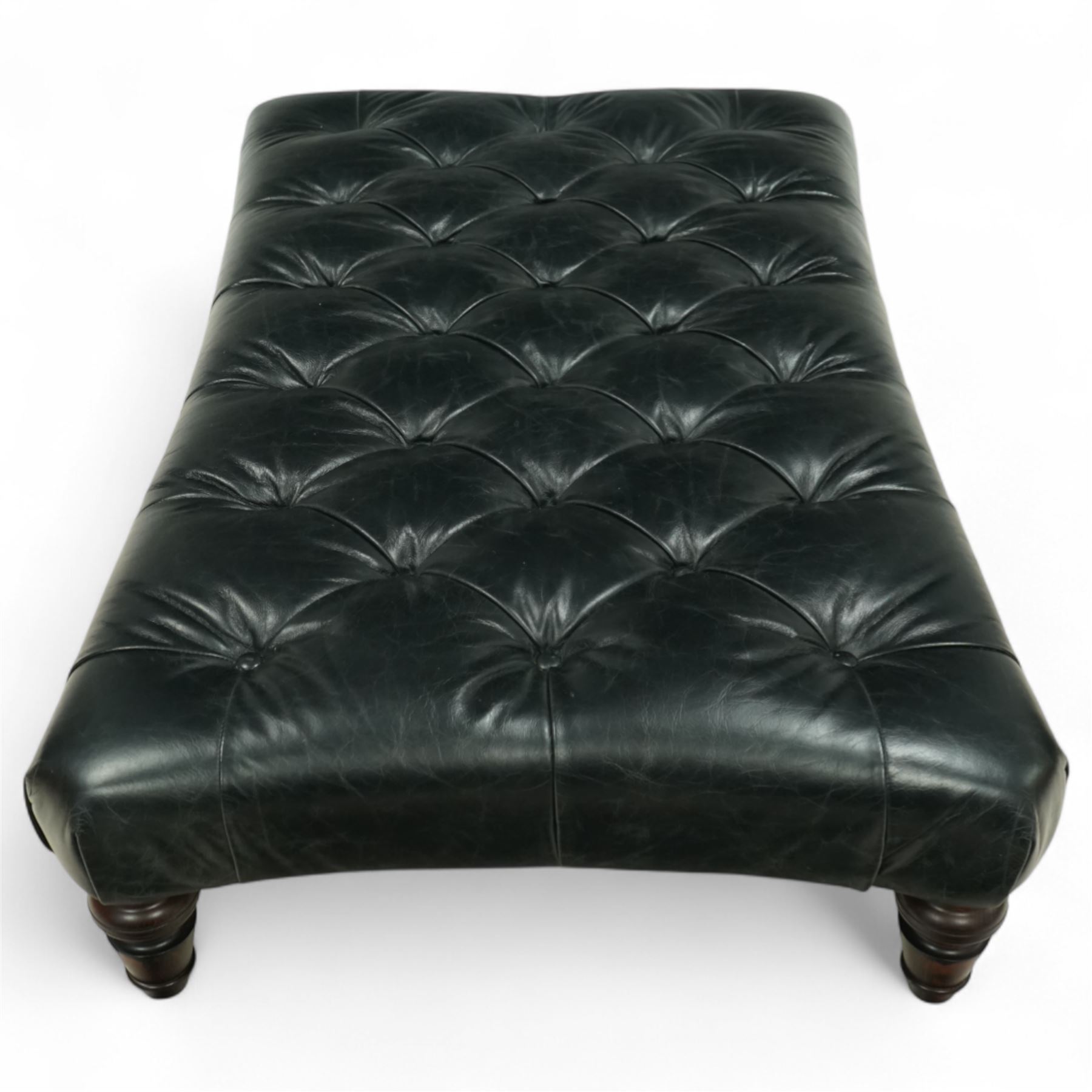 Tetrad – Contemporary black leather upholstered stool, deep button top with pulled finish, on turned stained hardwood legs