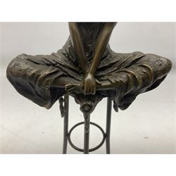 Art Deco style bronze modelled as a female figure seating crossed legged upon a chair, after Pierre Collinet, H28cm