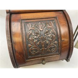 Victorian mahogany coal scuttle, the domed rolling lid carved with ornate foliate motifs opening to reveal interior with twin handled liner, mounted with carrying handle and shovel, together with brass fireside tools, largest H46cm