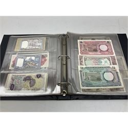 World banknotes, including Queen Elizabeth II The States of Jersey one pound 'DB202703', five pounds 'BB527762' and ten pounds 'AB651481', reserve bank of New Zealand two dollars '1L3 741894', King George V Straits Settlements one dollar 1st January 1935 'F/83 28924', various Bank of England notes etc, housed in two ring binder albums