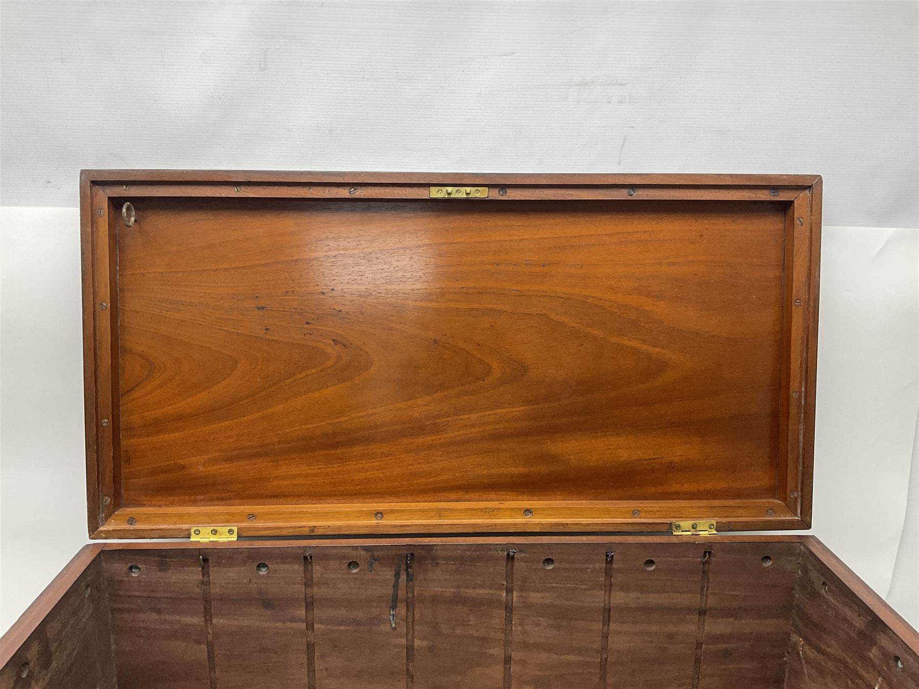 19th century teak chest, with sunken brass handle, the hinged lid with brass plaque engraved 'H.H. Earle 1899', H34cm, L83cm, notes: reputedly the chest of H.H.Earle, daughter of George F Earle of the Earle shipbuilding family of Hull 