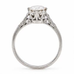 Platinum diamond ring, single round brilliant cut diamond of approx 0.85 carat, with diamond set shoulders, stamped Plat