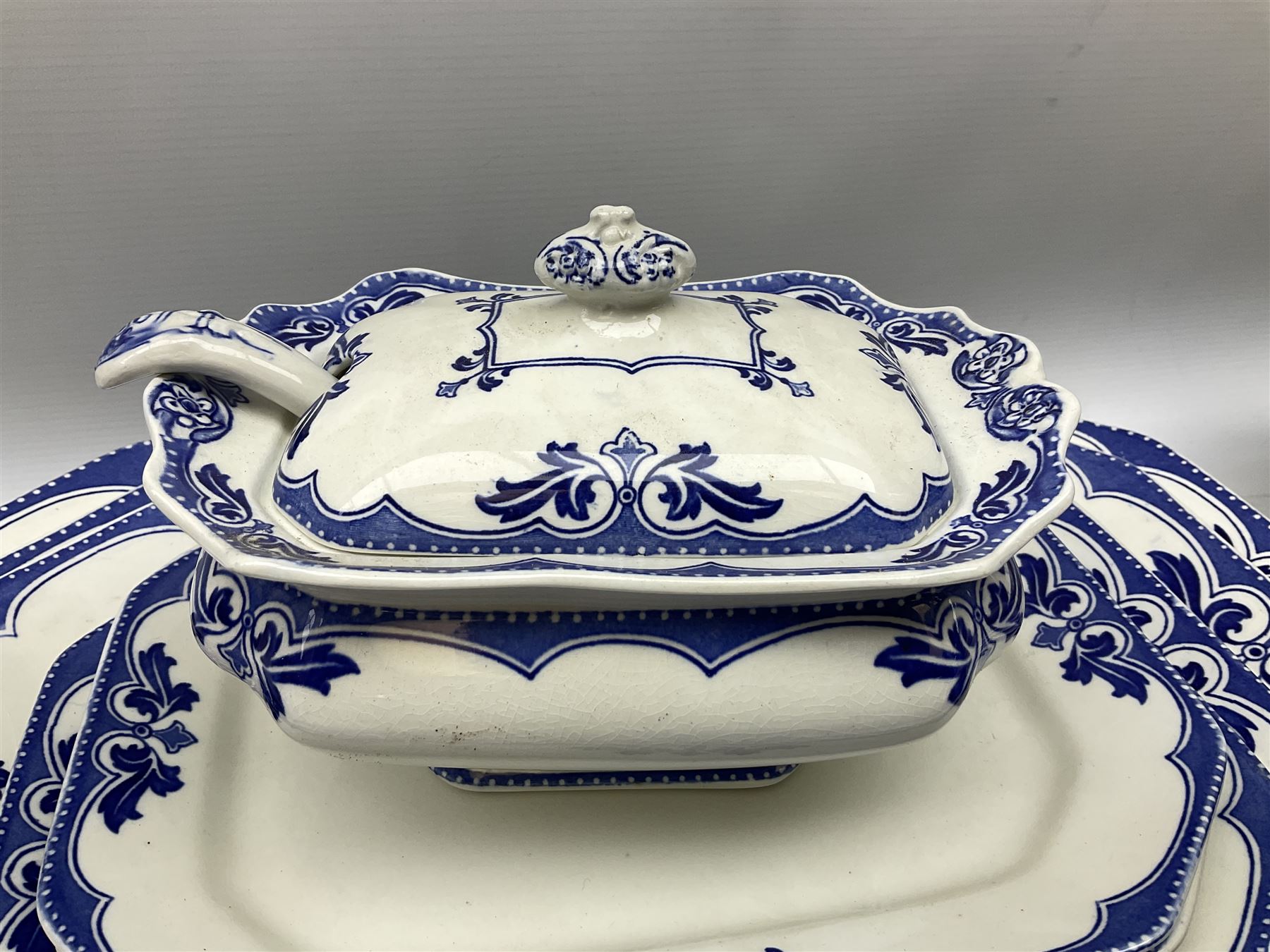 Burgess and Leigh Middleport pottery dinner wares decorated in the ‘Milford’ pattern, to include lidded tureens, graduated meat plates, dinner plates etc 