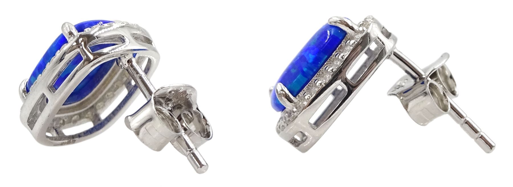 Pair of silver opal and cubic zirconia cluster stud earrings, stamped 925 