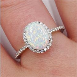 Silver opal and cubic zirconia cluster ring, stamped 925