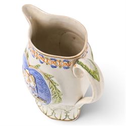18th century South Yorkshire prattware jug, moulded in relief a band of stylised leaves,  with  'Mischievous Sport' and 'Sportive Innocence' pattern to the centre, H19cm